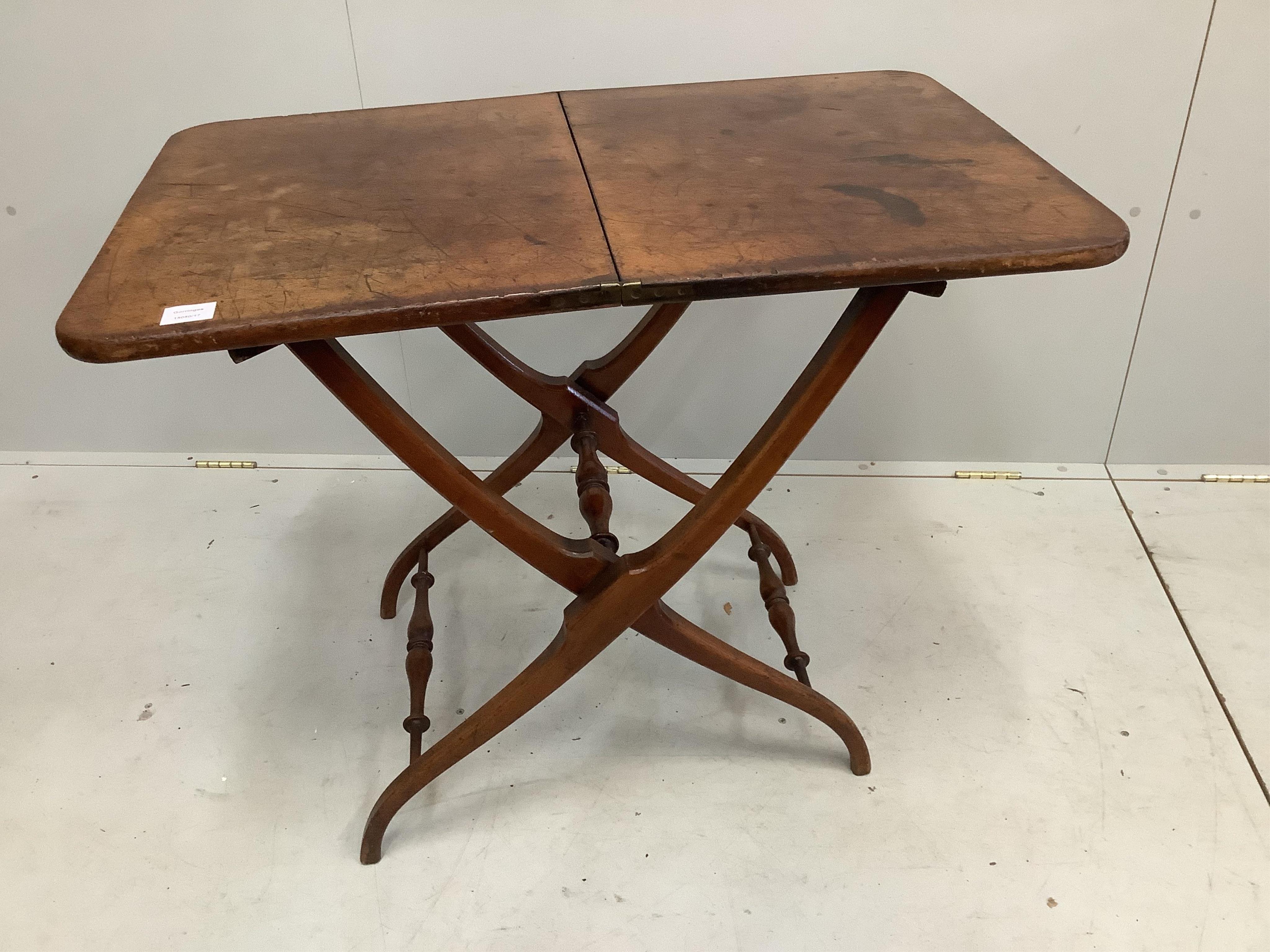 A Victorian rectangular mahogany folding coaching table, width 90cm, depth 58cm, height 74cm. Condition - fair